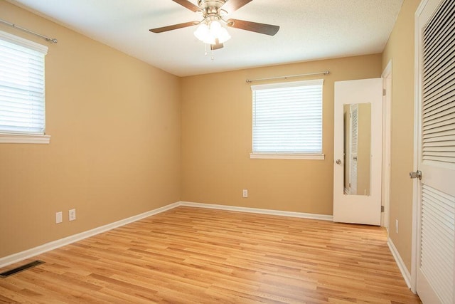 505 Heidi Cir, Chattanooga, TN 37415 - unfurnished bedroom featuring light wood-style floors, ceiling fan, and a closet
