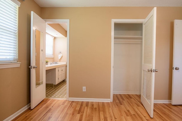 505 Heidi Cir, Chattanooga, TN 37415 - unfurnished bedroom featuring light wood-type flooring and a closet