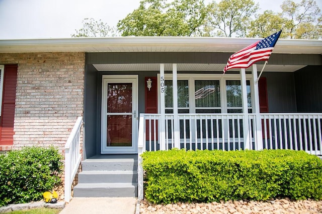505 Heidi Cir, Chattanooga, TN 37415 - view of exterior entry featuring brick siding and a porch