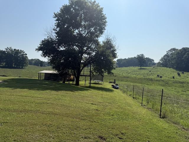 2487 Corinth Rd, Lafayette, GA 30728 - view of yard featuring a view of countryside, an outbuilding, and a trampoline