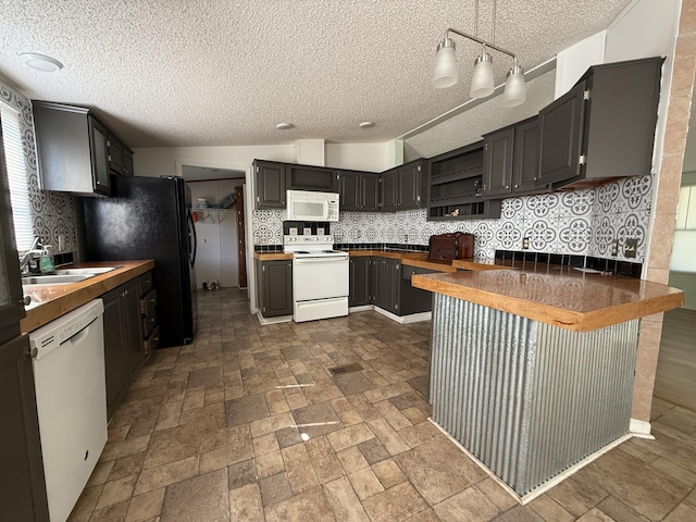 2487 Corinth Rd, Lafayette, GA 30728 - kitchen featuring white appliances, decorative backsplash, a textured ceiling, a peninsula, and open shelves