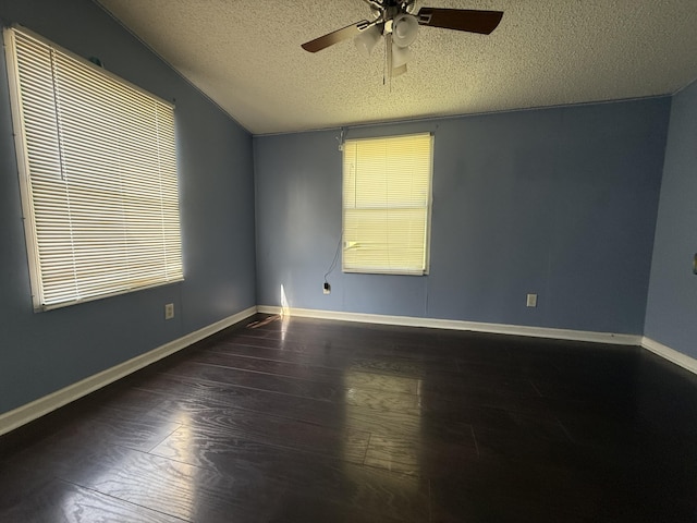 2487 Corinth Rd, Lafayette, GA 30728 - spare room with a textured ceiling, wood finished floors, ceiling fan, and vaulted ceiling