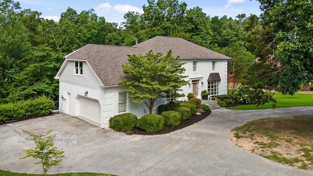 9420 Mountain Shadows Dr, Chattanooga, TN 37421 - view of front of home with driveway, a shingled roof, and an attached garage