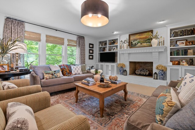 9420 Mountain Shadows Dr, Chattanooga, TN 37421 - living room featuring built in features and a brick fireplace