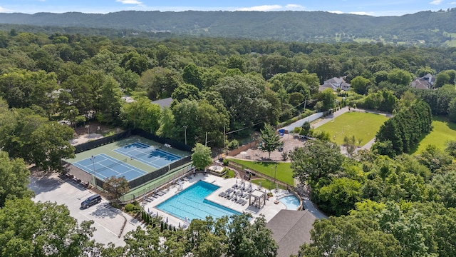9420 Mountain Shadows Dr, Chattanooga, TN 37421 - drone / aerial view of a pool and a mountainous background