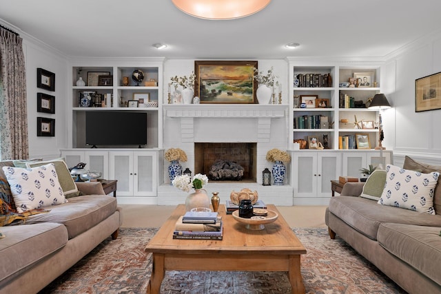 9420 Mountain Shadows Dr, Chattanooga, TN 37421 - living room featuring built in shelves, crown molding, and a fireplace