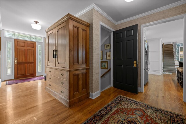 9420 Mountain Shadows Dr, Chattanooga, TN 37421 - entrance foyer featuring light wood-style flooring, stairway, and ornamental molding