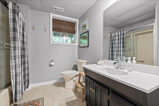 9420 Mountain Shadows Dr, Chattanooga, TN 37421 - full bath featuring a paneled ceiling, vanity, tile patterned flooring, and shower / tub combo