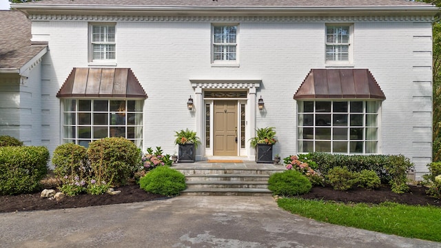 9420 Mountain Shadows Dr, Chattanooga, TN 37421 - view of front facade featuring brick siding and roof with shingles