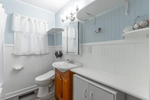 1602 Prater Rd, Chattanooga, TN 37412 - full bathroom with vanity, crown molding, wood finished floors, and a shower