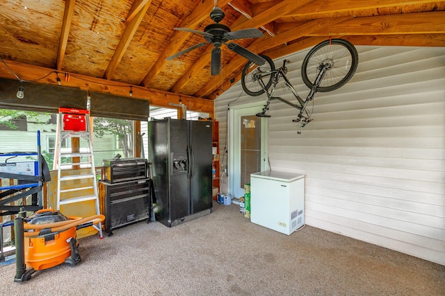 1602 Prater Rd, Chattanooga, TN 37412 - garage with black fridge with ice dispenser, fridge, ceiling fan, wood walls, and wooden ceiling