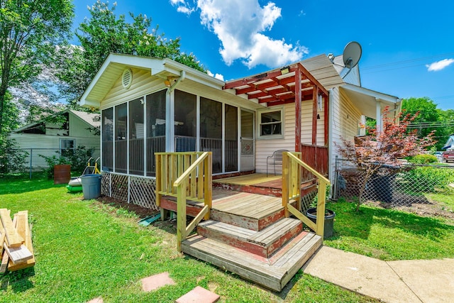 1602 Prater Rd, Chattanooga, TN 37412 - rear view of house with a sunroom and a deck