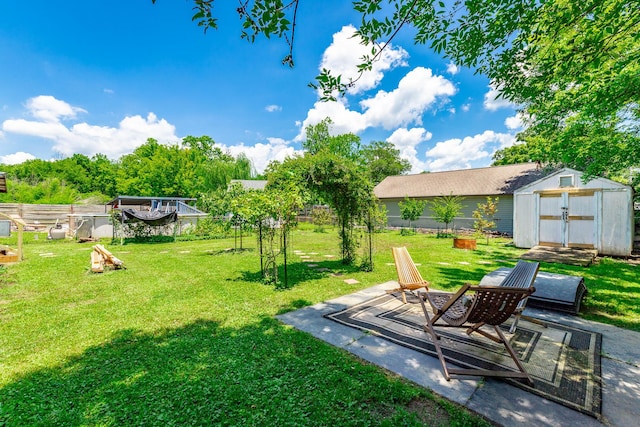 1602 Prater Rd, Chattanooga, TN 37412 - view of yard featuring a storage unit and a patio