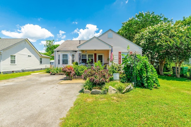 1602 Prater Rd, Chattanooga, TN 37412 - bungalow-style home featuring a front yard and a porch