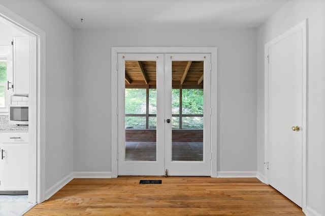 3671 Thrushwood Dr, Chattanooga, TN 37415 - doorway to outside with healthy amount of natural light, light wood-type flooring, and french doors