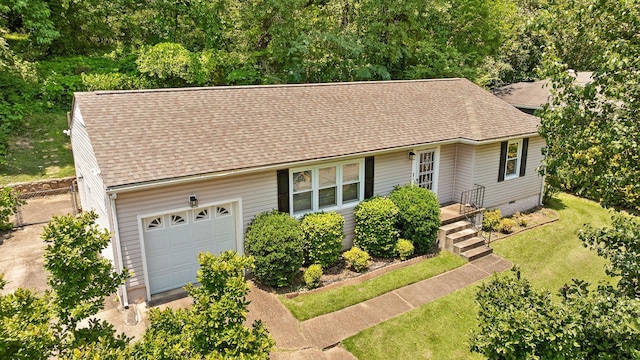 3671 Thrushwood Dr, Chattanooga, TN 37415 - view of front of home featuring an attached garage, roof with shingles, a front yard, and driveway
