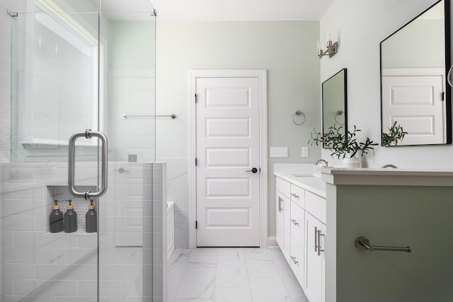 09 Emmeline Way Unit 09, Hixson, TN 37343 - bathroom with vanity, marble look tiles, and a shower with shower door