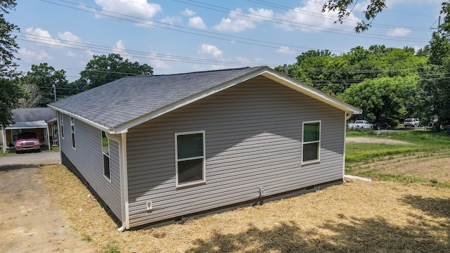 1150 Lang St NE, Cleveland, TN 37311 - view of property exterior featuring a shingled roof and crawl space