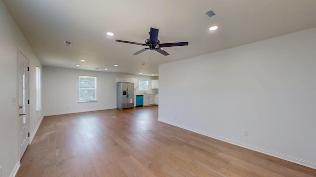 1150 Lang St NE, Cleveland, TN 37311 - unfurnished living room featuring a ceiling fan, recessed lighting, and wood finished floors