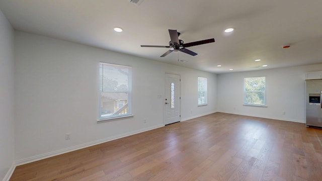 1150 Lang St NE, Cleveland, TN 37311 - unfurnished living room with recessed lighting, wood finished floors, and a ceiling fan