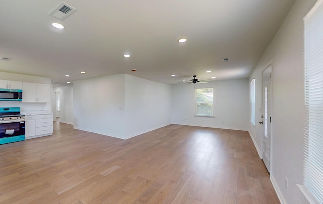1150 Lang St NE, Cleveland, TN 37311 - unfurnished living room with ceiling fan, light wood-style floors, and recessed lighting