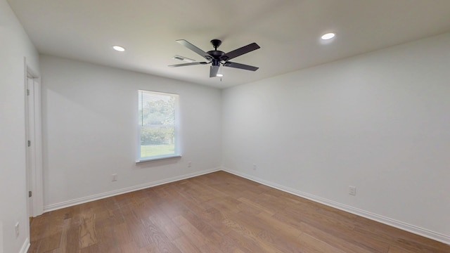 1150 Lang St NE, Cleveland, TN 37311 - spare room with wood finished floors, a ceiling fan, and recessed lighting