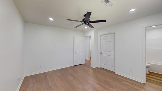 1150 Lang St NE, Cleveland, TN 37311 - unfurnished bedroom with recessed lighting, wood finished floors, ensuite bath, and a ceiling fan