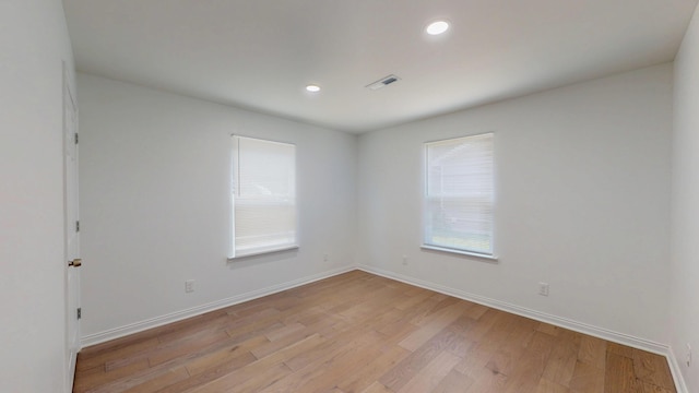1150 Lang St NE, Cleveland, TN 37311 - spare room featuring light wood finished floors, healthy amount of natural light, and recessed lighting