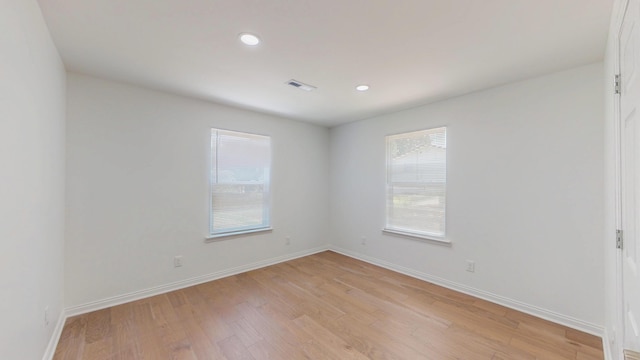 1150 Lang St NE, Cleveland, TN 37311 - unfurnished room featuring healthy amount of natural light, light wood-style flooring, and recessed lighting