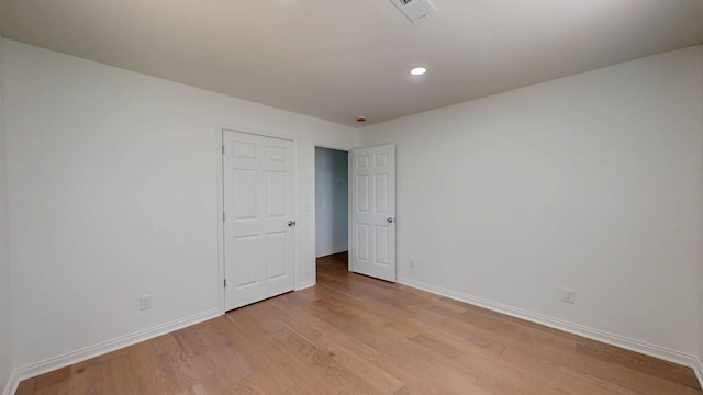 1150 Lang St NE, Cleveland, TN 37311 - unfurnished room featuring light wood-type flooring and recessed lighting