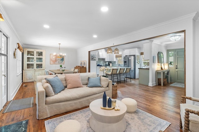 110 Linden St, Lookout Mountain, TN 37350 - living room with a chandelier, wood finished floors, crown molding, and recessed lighting