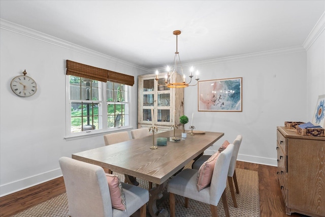110 Linden St, Lookout Mountain, TN 37350 - dining space with a chandelier, ornamental molding, and dark wood-style floors