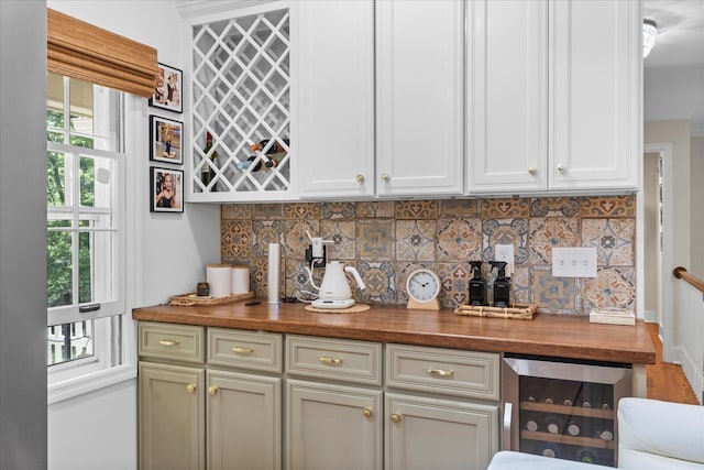 110 Linden St, Lookout Mountain, TN 37350 - indoor dry bar with wine cooler and decorative backsplash