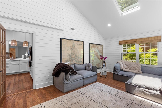 110 Linden St, Lookout Mountain, TN 37350 - living room with dark wood-style floors, a skylight, wood walls, high vaulted ceiling, and recessed lighting