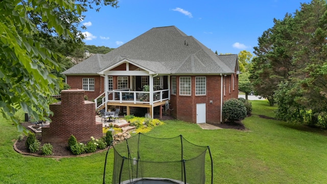 4101 Finch Ln, Chattanooga, TN 37419 - back of house featuring brick siding, a lawn, and a wooden deck