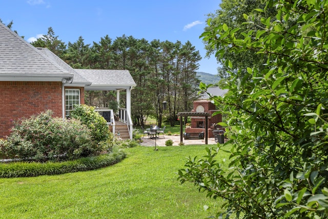 4101 Finch Ln, Chattanooga, TN 37419 - view of green lawn featuring a patio area