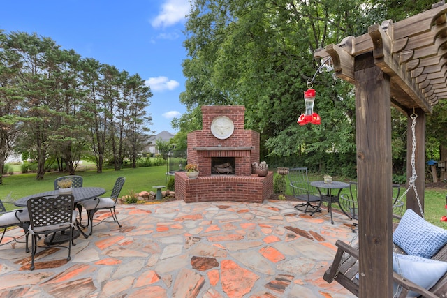 4101 Finch Ln, Chattanooga, TN 37419 - view of patio / terrace with an outdoor brick fireplace and outdoor dining space