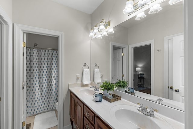 4101 Finch Ln, Chattanooga, TN 37419 - full bathroom with double vanity, a chandelier, and curtained shower