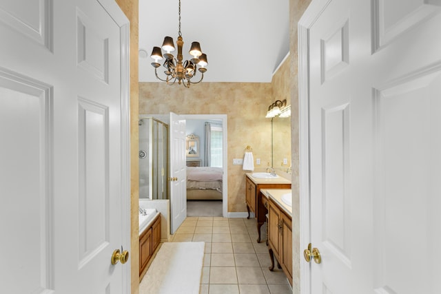 4101 Finch Ln, Chattanooga, TN 37419 - ensuite bathroom with a chandelier, tile patterned flooring, a shower stall, and two vanities
