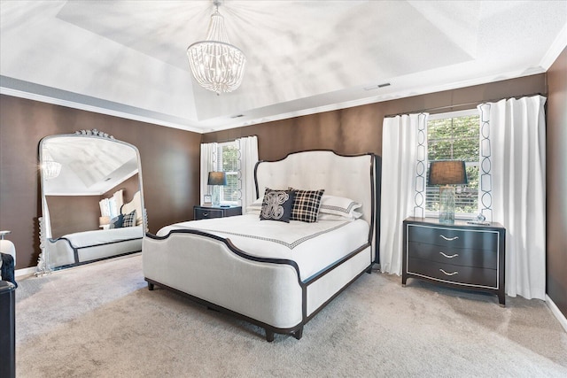 1003 Woodfern Trl, Hixson, TN 37343 - carpeted bedroom featuring a tray ceiling, multiple windows, and a chandelier