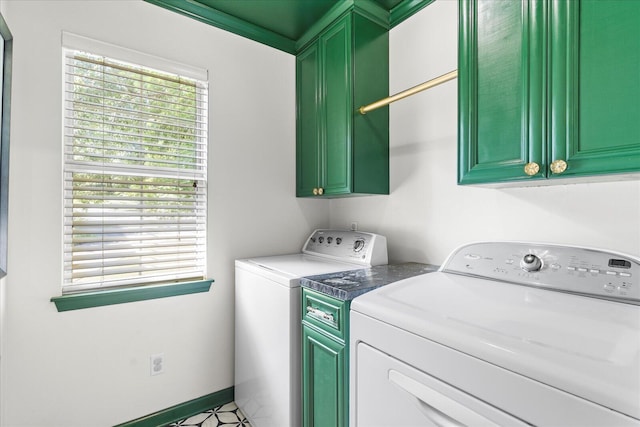 1003 Woodfern Trl, Hixson, TN 37343 - laundry area with cabinet space and washing machine and dryer