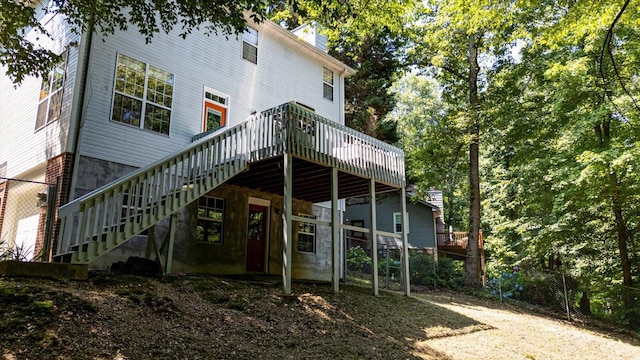 1003 Woodfern Trl, Hixson, TN 37343 - back of property featuring stairs, a deck, and a chimney
