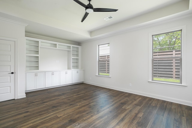 7853 Lemonade St, Chattanooga, TN 37421 - empty room featuring dark wood-type flooring, ceiling fan, and ornamental molding