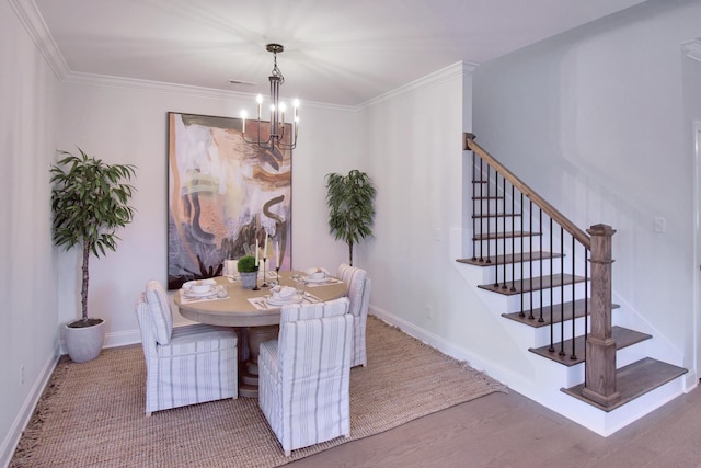 7829 Lemonade St, Chattanooga, TN 37421 - dining room with a chandelier, stairway, ornamental molding, and wood finished floors