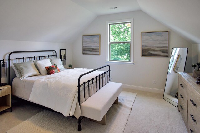 7829 Lemonade St, Chattanooga, TN 37421 - bedroom featuring light colored carpet and vaulted ceiling