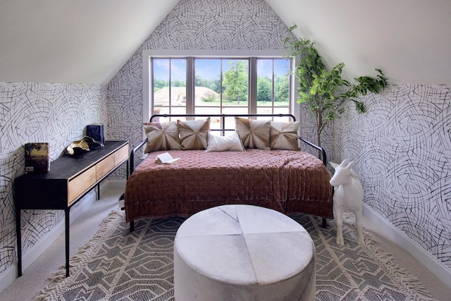 7829 Lemonade St, Chattanooga, TN 37421 - bedroom featuring wallpapered walls, vaulted ceiling, and dark carpet
