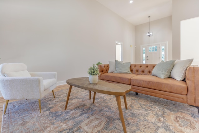 2001 Hamilton Brow Path, Chattanooga, TN 37421 - living area with high vaulted ceiling, a chandelier, and wood finished floors