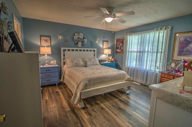 11080 US-11, Trenton, GA 30752 - bedroom featuring dark wood-style flooring, a textured ceiling, and ceiling fan