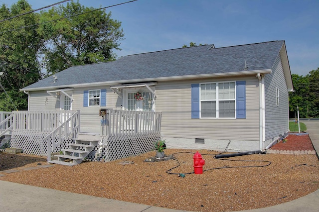 11080 US-11, Trenton, GA 30752 - view of front of home with crawl space, a deck, and a shingled roof