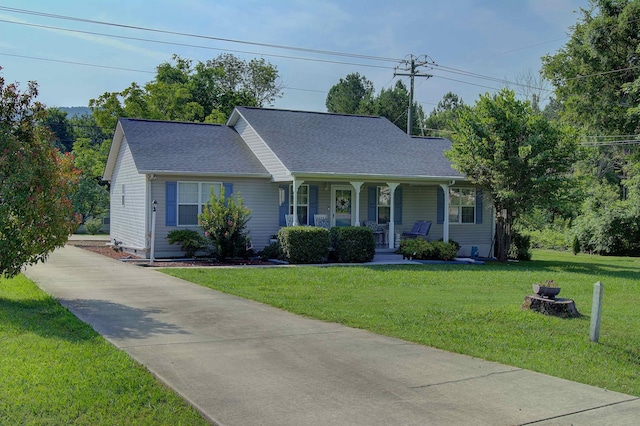 11080 US-11, Trenton, GA 30752 - view of front of property with covered porch, a front yard, driveway, and roof with shingles